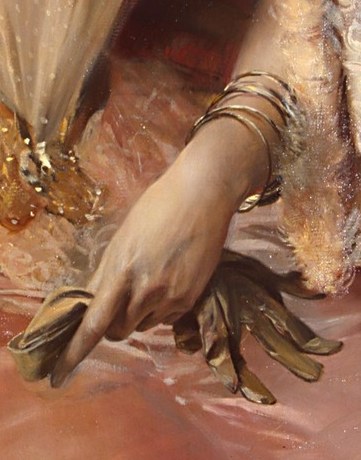 The fan in her hand shows her refined taste.