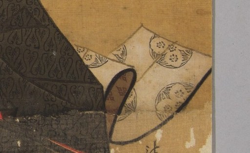 Even the patterned fan suggests artistic sensibilities.