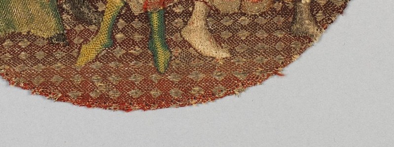 The intricate geometric pattern grounds the figures and hints at the domestic setting.