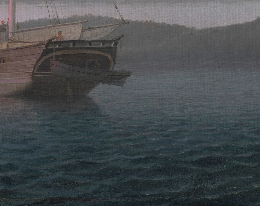 The mast reflections extend to make an inverted phantom ship.