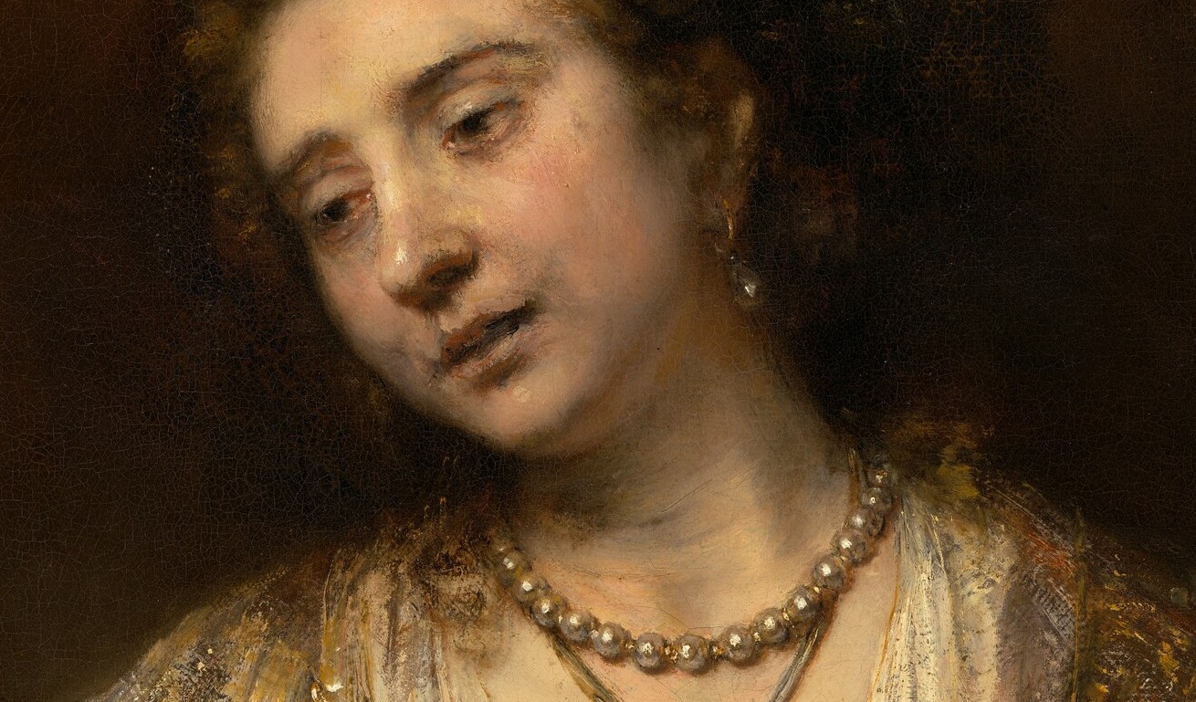 The pearls are her virtue. The red pendant, the blood to come.