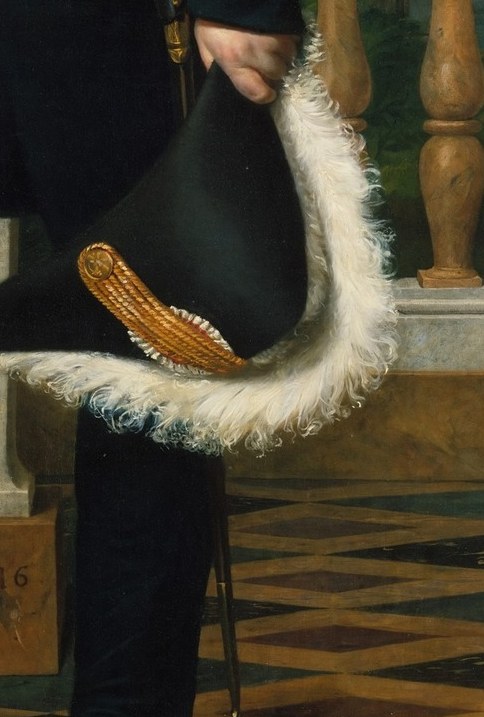 The sweeping white ostrich-feather plume forms a dramatic diagonal; held rather than worn, it reads as ceremonial dignity.