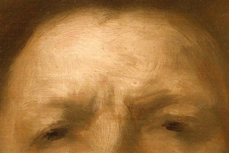 Steady eyes. A composed, almost romantic face.