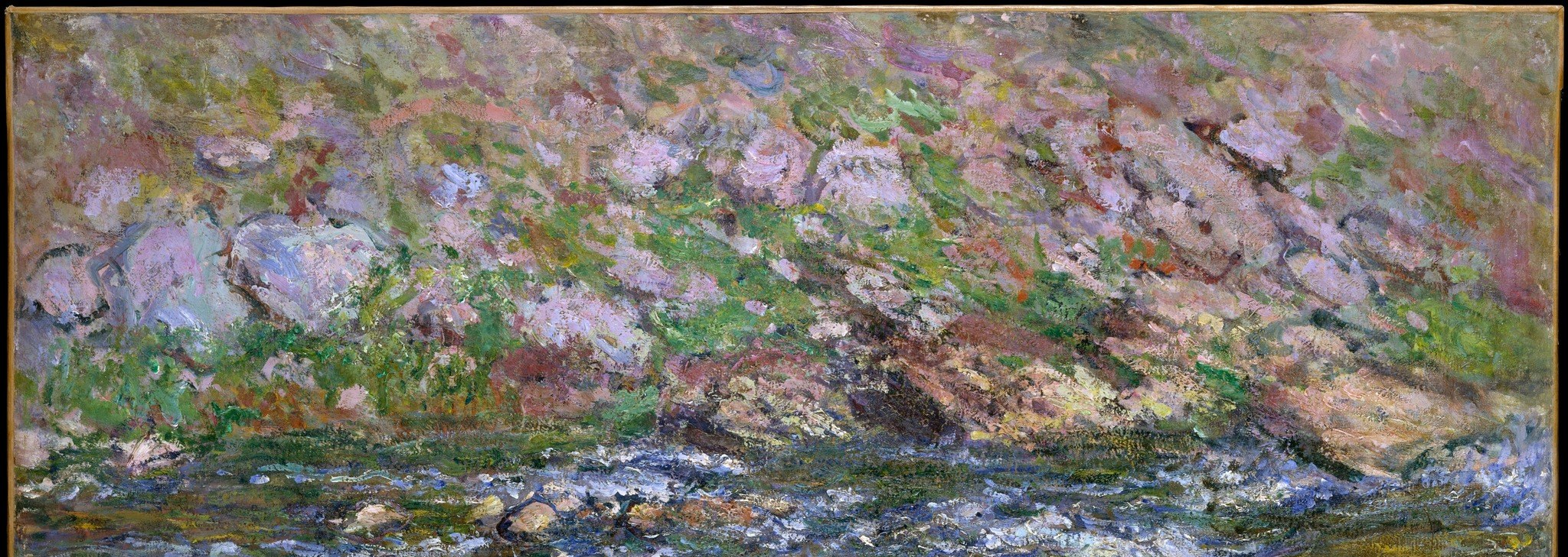 The foliage explodes with pink and purple.