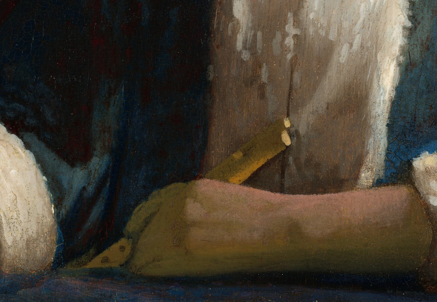 But the loose grip on the flute suggests a different hand.
