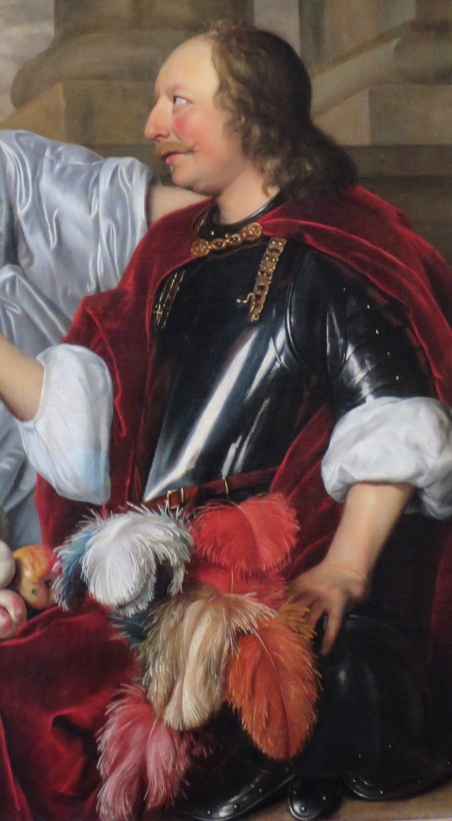 His stern gaze and military attire signify power, authority, or a martial theme.