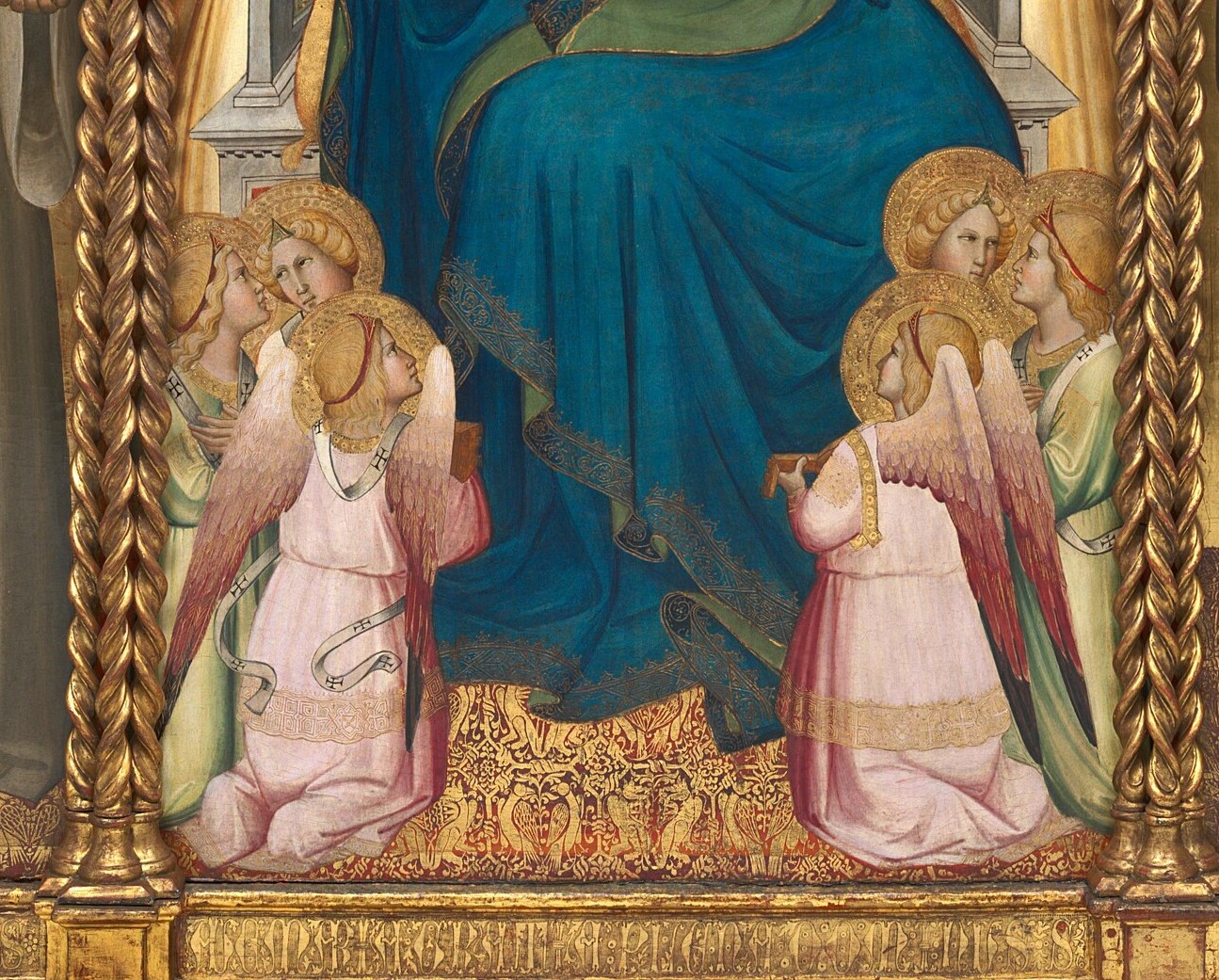These kneeling angels add celestial grace to the scene.