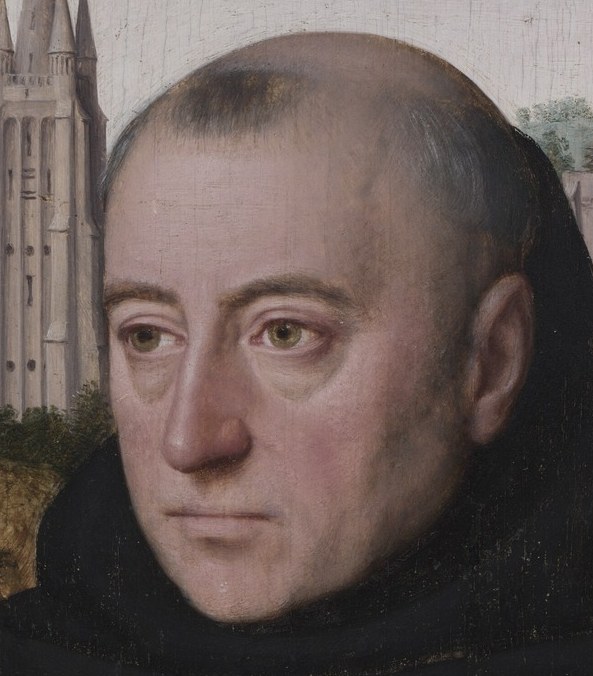 He stares directly at you. Unblinking.