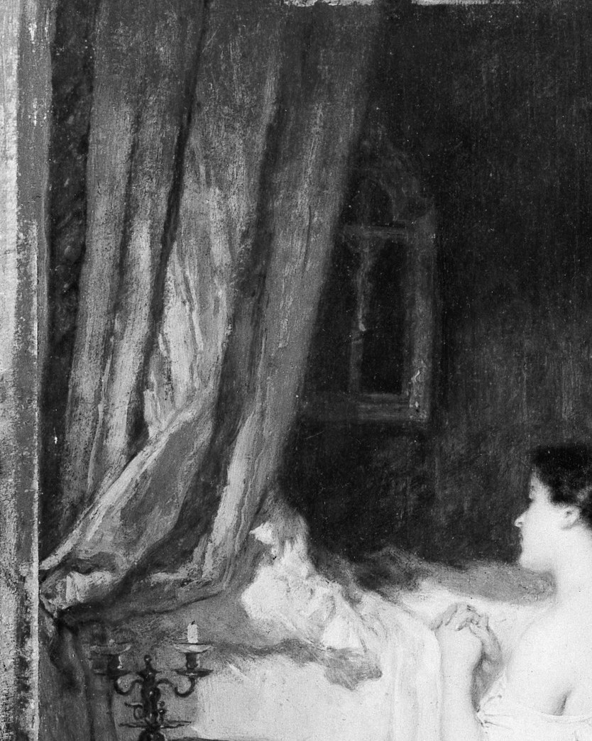 Light filters through the drawn curtain.