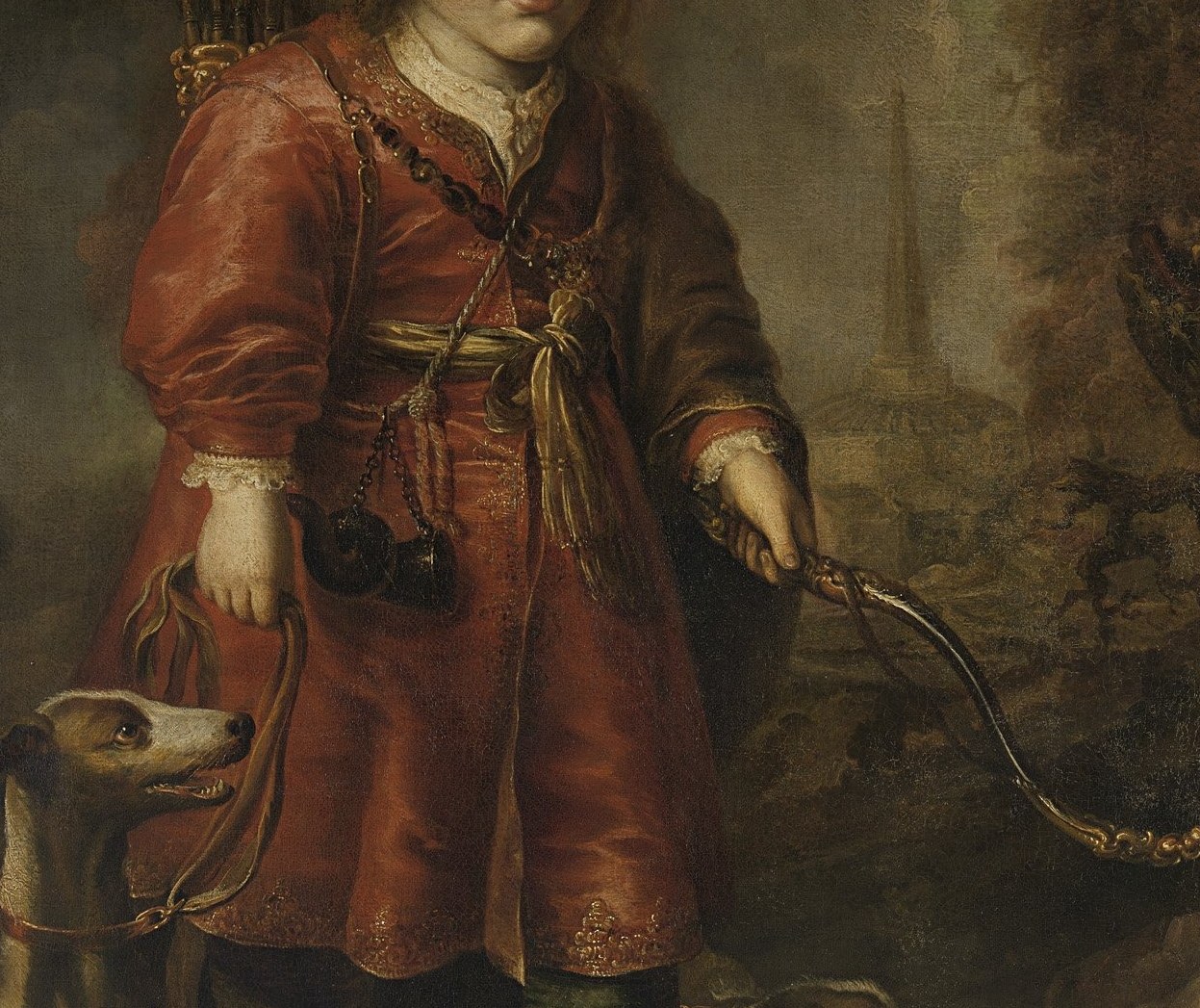 One is dressed as a hunter, with his dog and feathered hat.