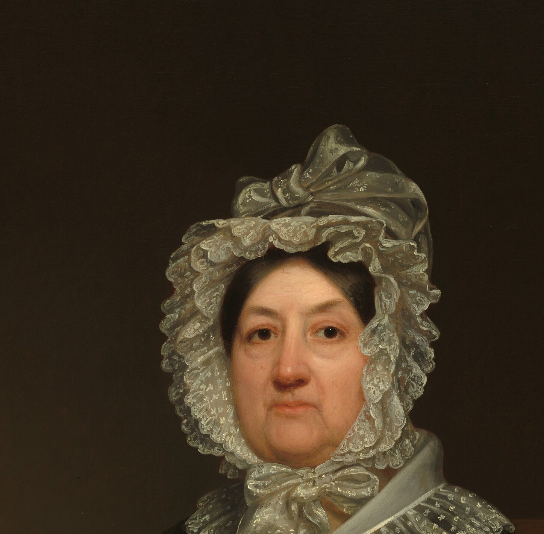 Her elaborate lace bonnet was a mark of status.