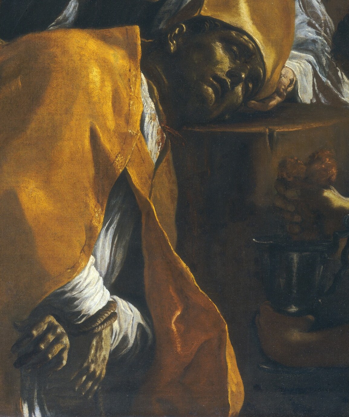 His yellow robe shines, a symbol of martyrdom.