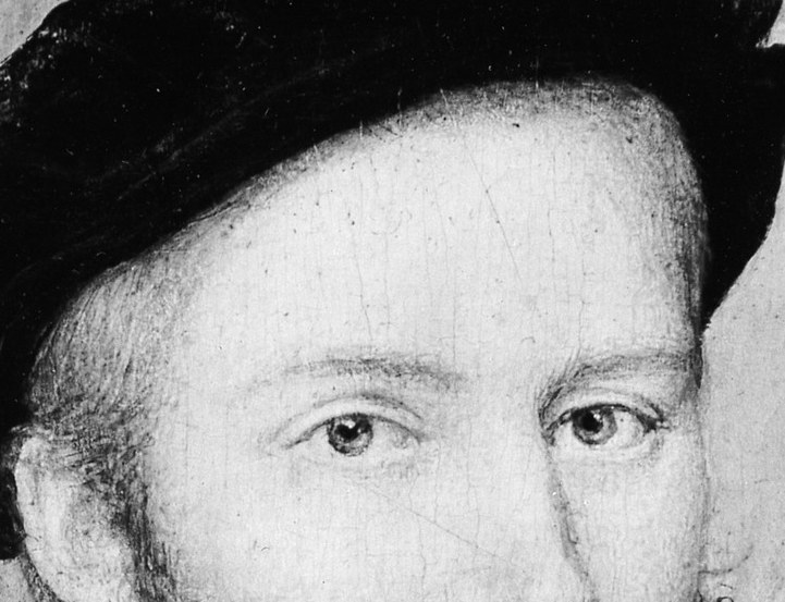 The dark, soft fabric of the hat contrasts with his skin, framing his face and adding to his dignified appearance.