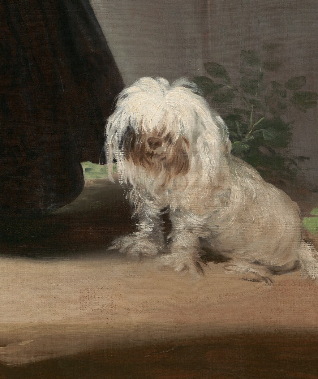 He added this little dog to make her look like a child.