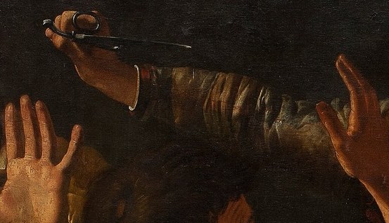 Then, a man brandishes his knife.