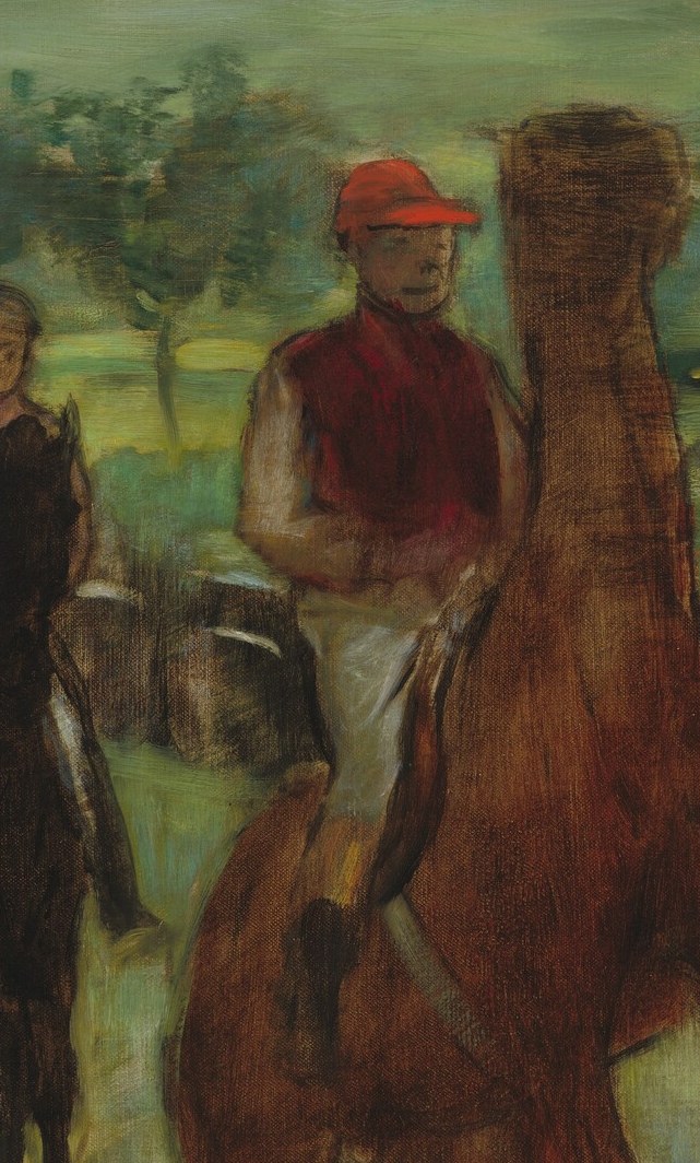 Look at the focused gaze of this jockey in the red cap.
