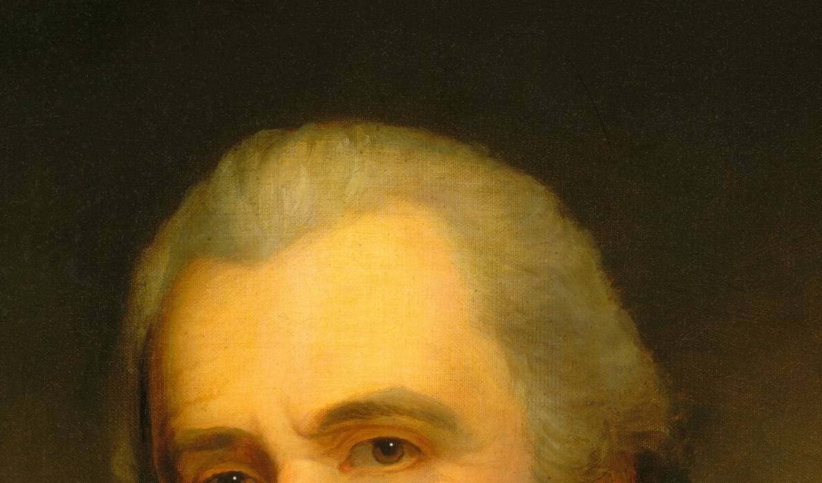 Eyes are the emotional anchor; the subtle downward cast gives a contemplative, inward quality unusual in formal portraiture.