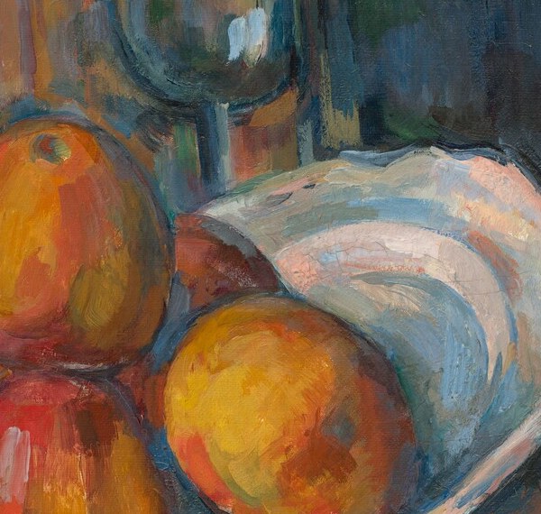 The warmest, most saturated point in the composition; Cézanne uses it as a chromatic fulcrum against the cooler whites and greens