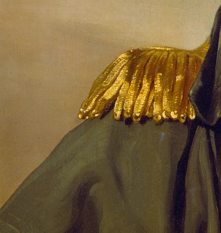 Look how the whole uniform builds a frame around the face.