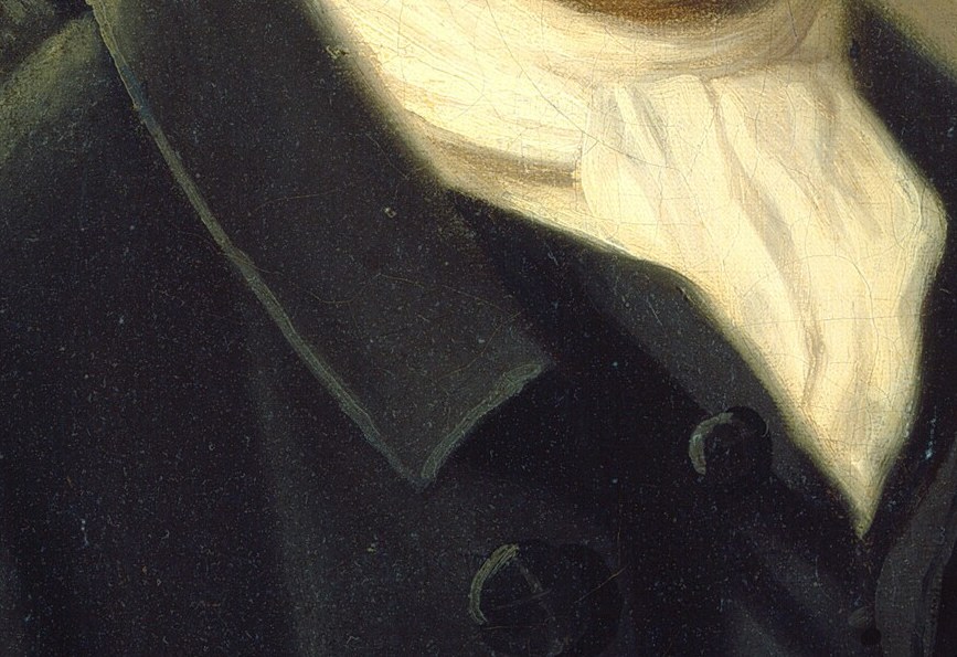 His stiff collar and bow tie were fashionable professional dress.
