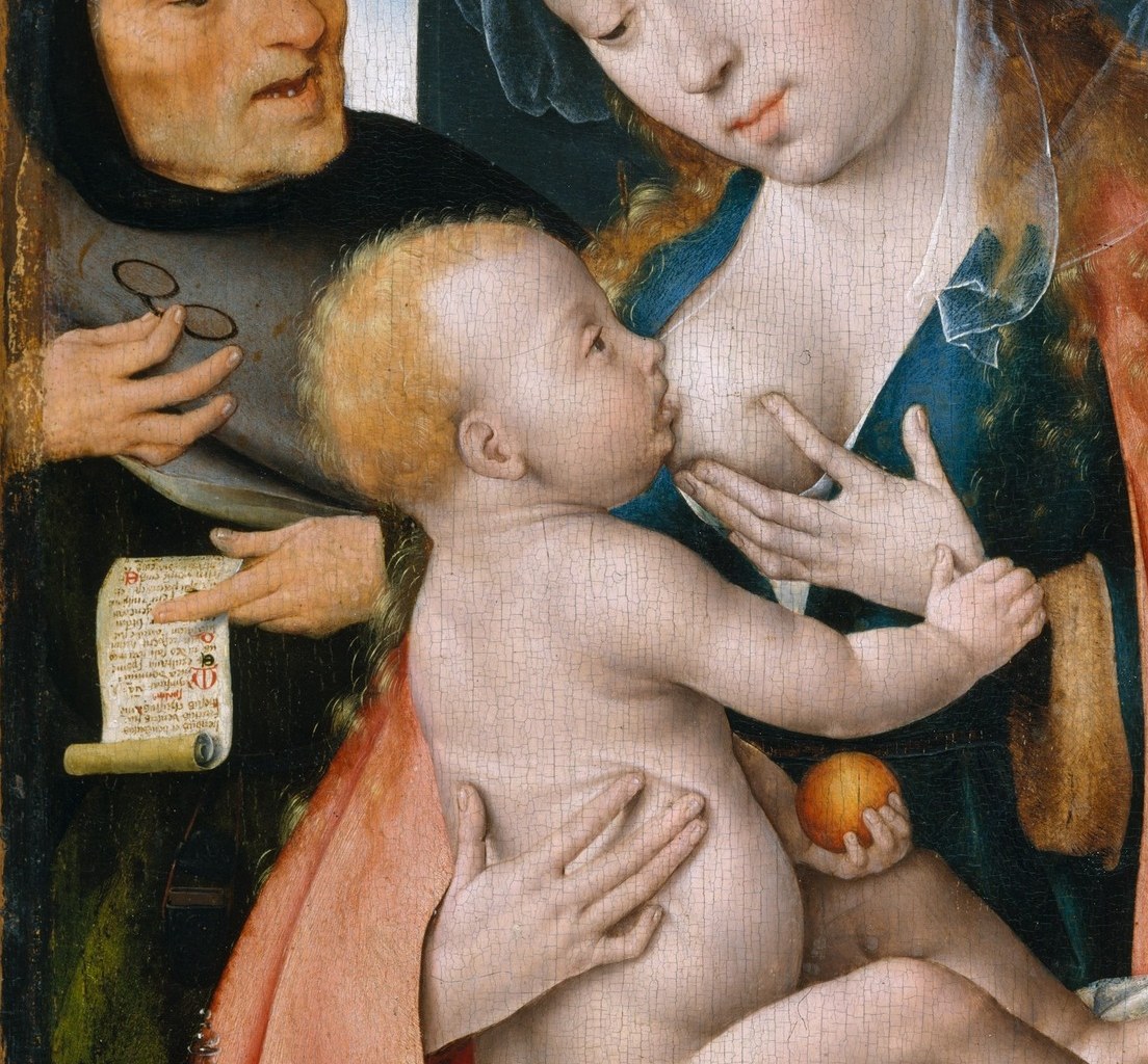 The saturated red garment is the dominant colour mass; red traditionally signals Christ's Passion , worn by Mary, it already mourns what the nursing scene celebrates.