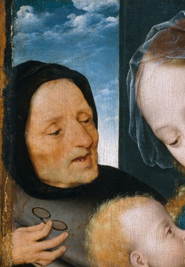 Positioned as an observer rather than participant, Joseph's calm gaze and grey beard mark him as witness and guardian , subtly subordinate to Mary.