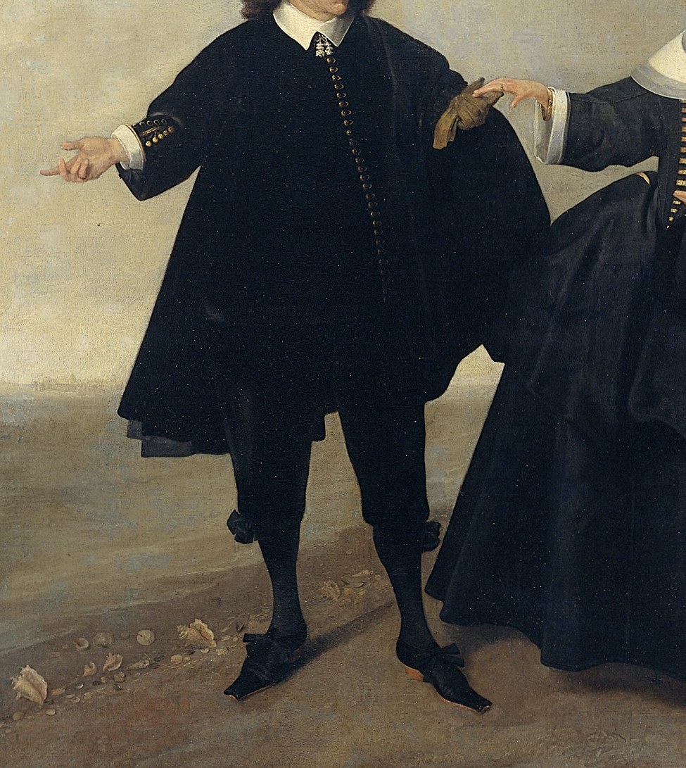 His dark coat, with rich fabric, shows his wealth.