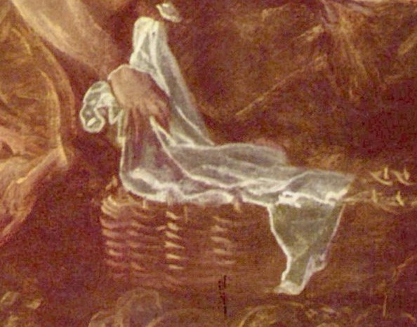 His empty basket lies beside her.