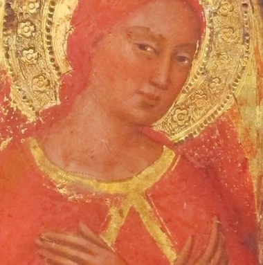 The radiant halo signifies divinity and spiritual illumination.