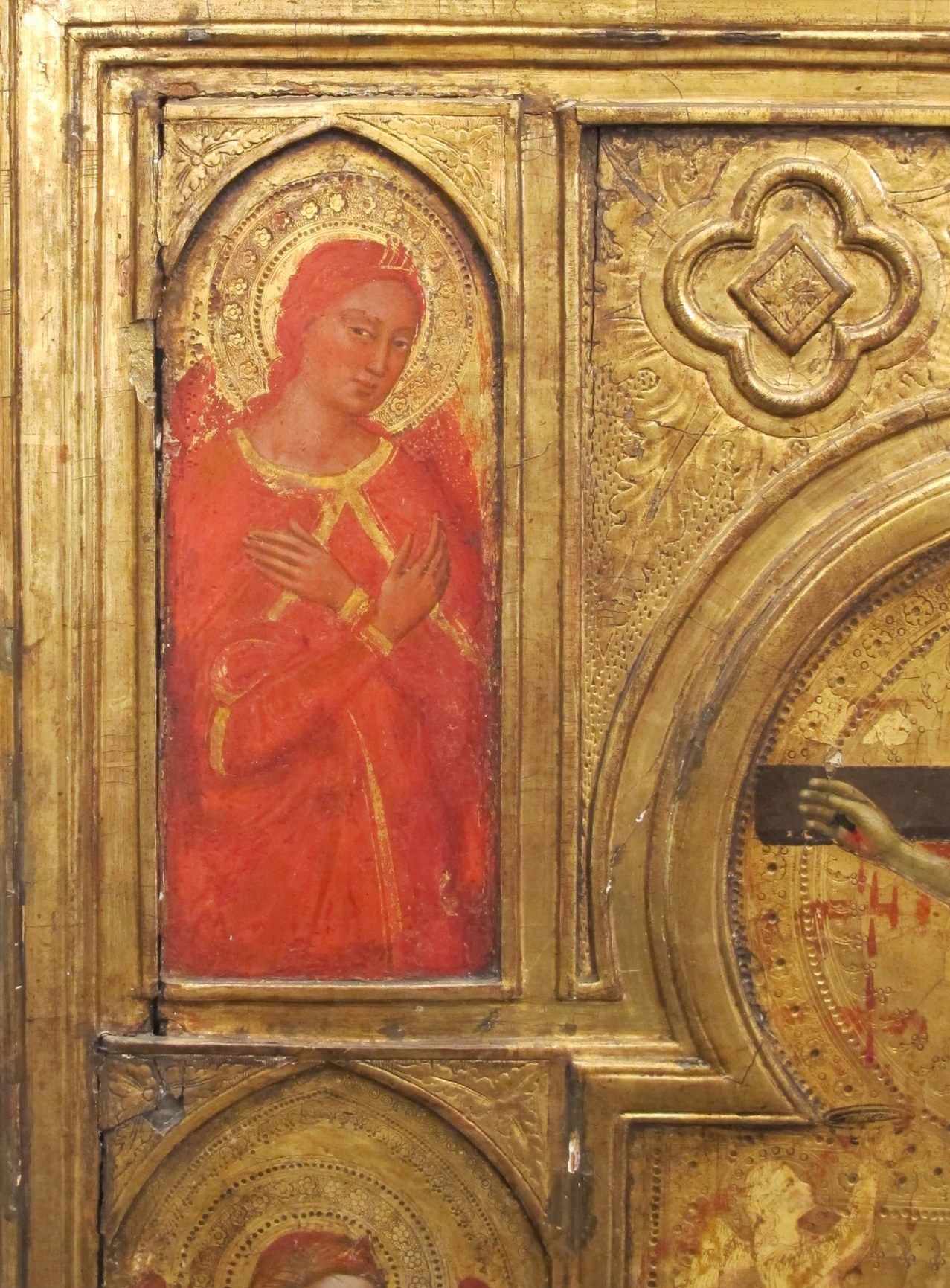 The gold leaf creates a sense of heavenly light and timelessness.