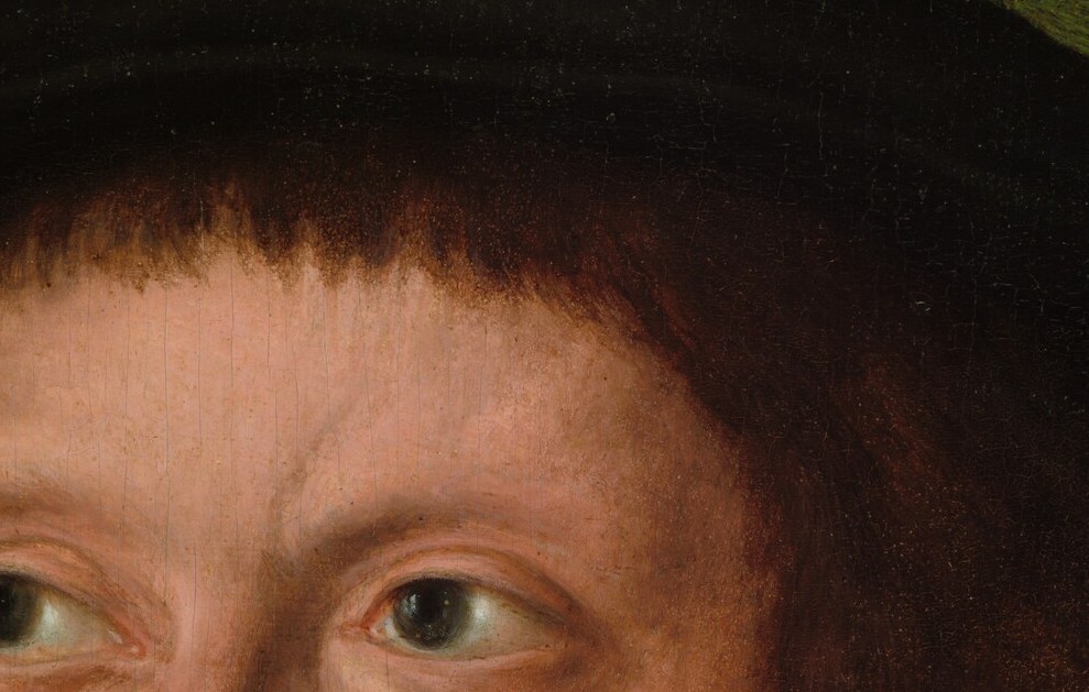 His eyes avoid direct confrontation.