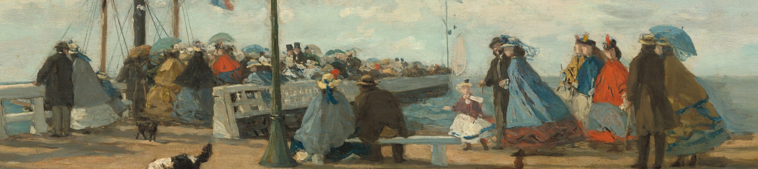 It's a bustling jetty scene, full of people enjoying the day.