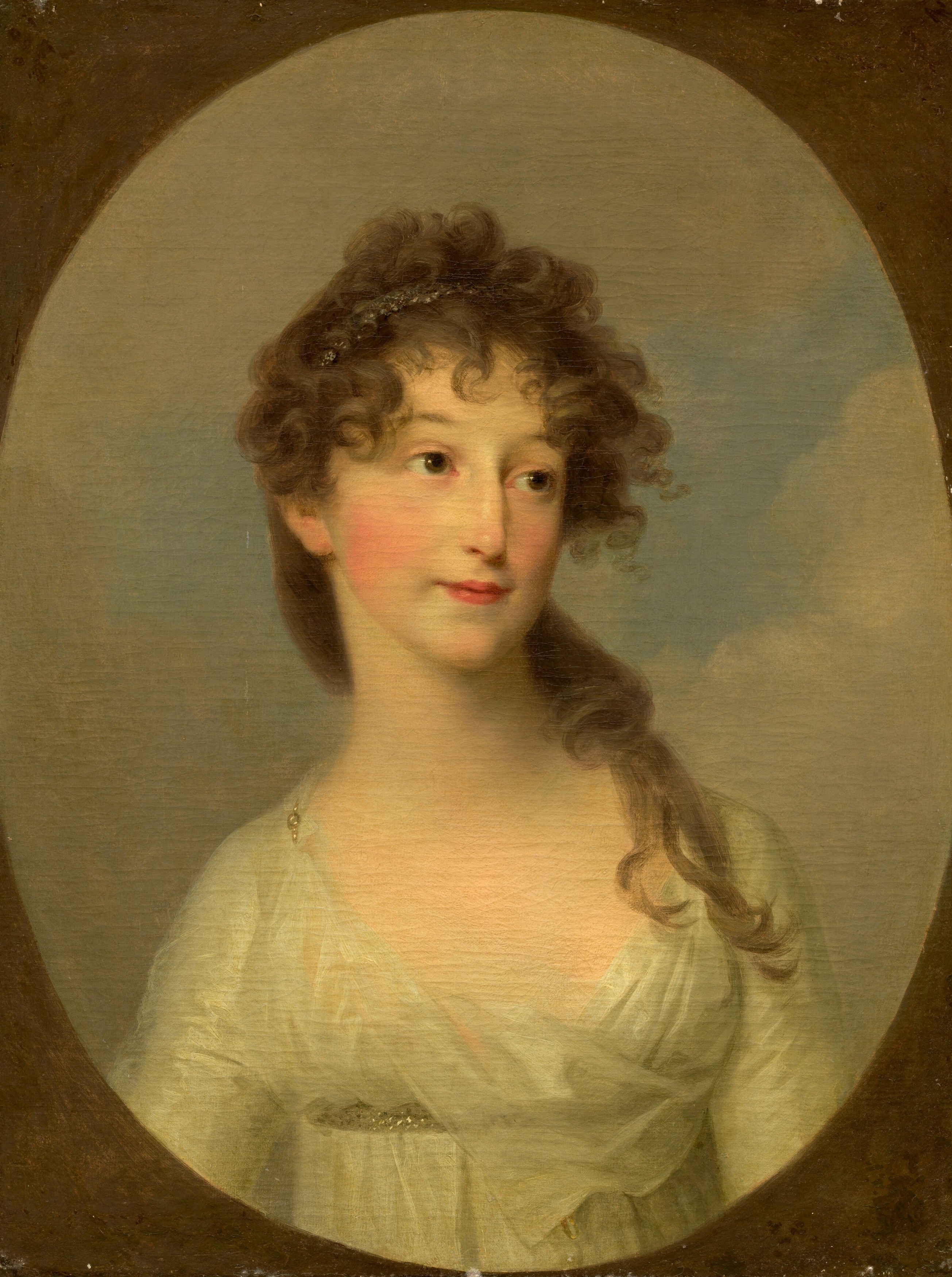 The plain, oval background isolates the sitter, emphasizing her presence and the portrait's focus.