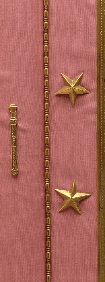 The border is scattered with gold stars, Legion of Honour emblems.