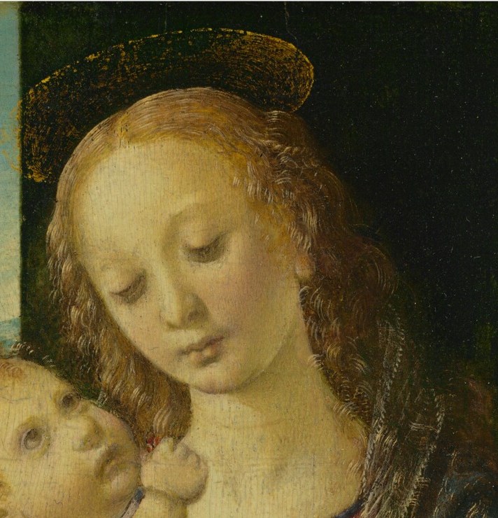 Serene, slightly averted expression characteristic of Verrocchio-workshop idealization; the tilt and softness of gaze carry the painting's emotional centre.