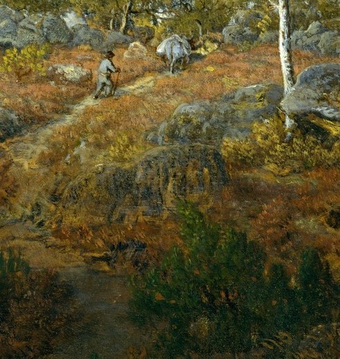 The path leads the viewer's eye into the scene, suggesting movement and a journey through the rugged terrain.