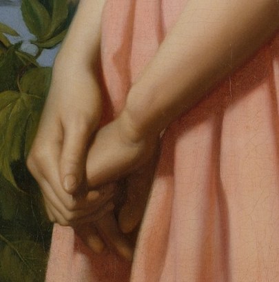 Her quiet, folded hands add to the serene, idealized image.