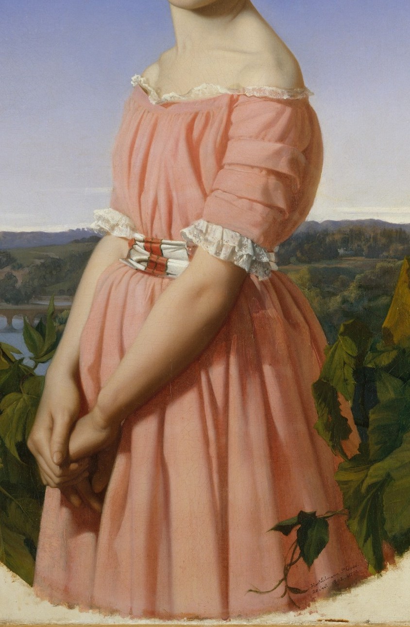 The soft fabric and puffed sleeves create a delicate silhouette, emphasizing her youth and fragility.