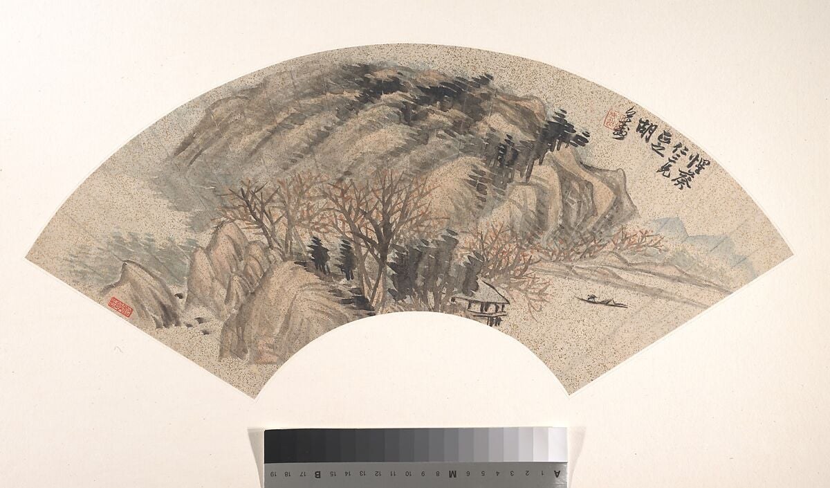 The artist, Hu Yuan, used ink and color on gold-flecked paper.