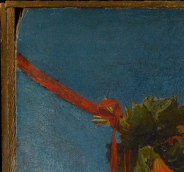 On the left: a balsam pear. An obscure Marian symbol.