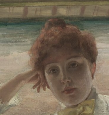 She seems poised in a quiet moment of reflection.