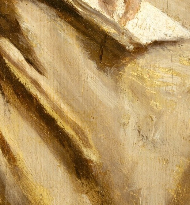 The light highlights the letter she holds.