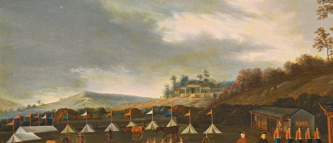 The precisely aligned tents betray military-encampment organization; the regularity shows a formal government-sponsored event, not a casual gathering.