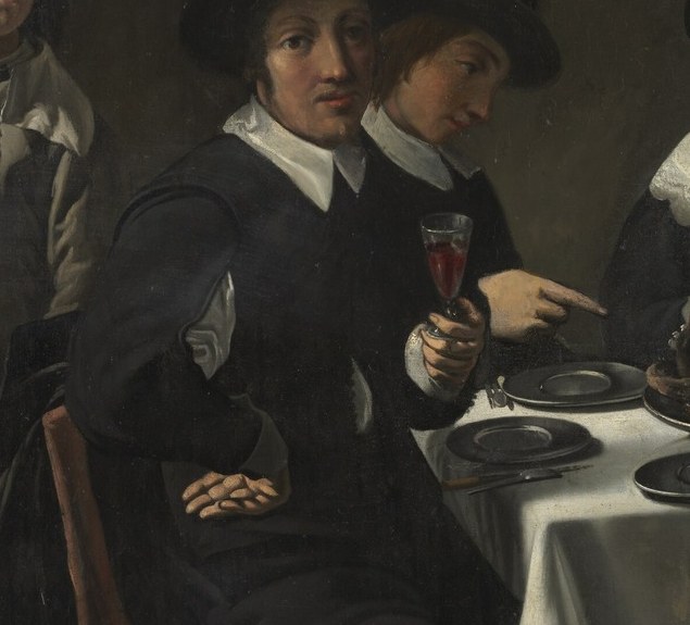 His gaze is directed outward, suggesting a moment of contemplation or perhaps a subtle acknowledgment of the viewer.