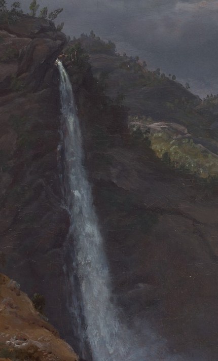 Look closely at the base of this mighty waterfall.