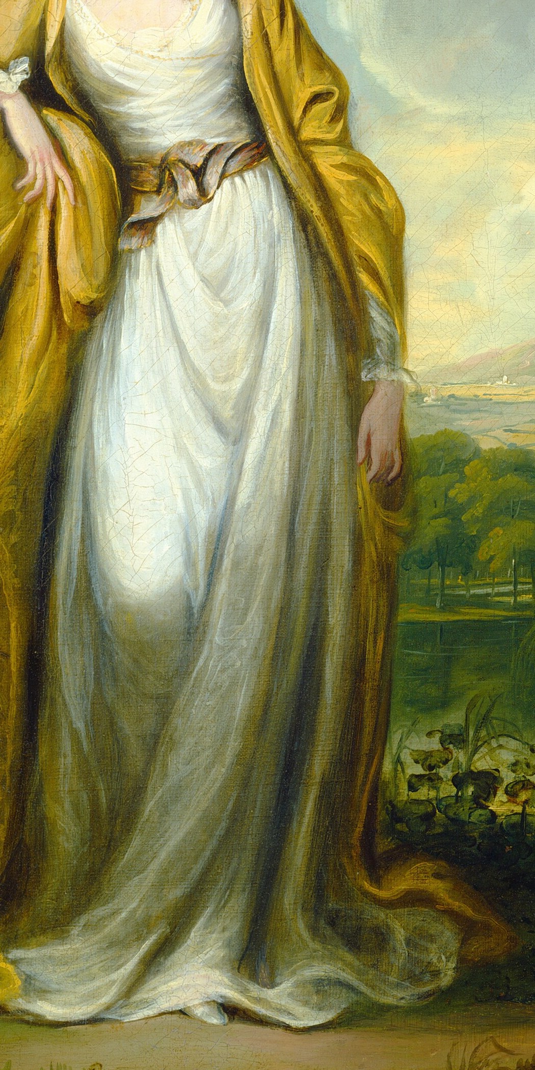 The gold shawl, draped elegantly, displayed her wealth.