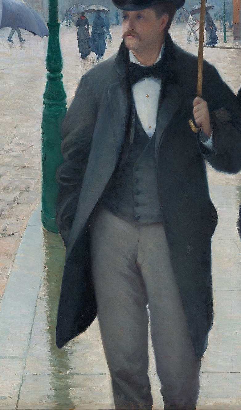 He wears the stiff top hat of the era.