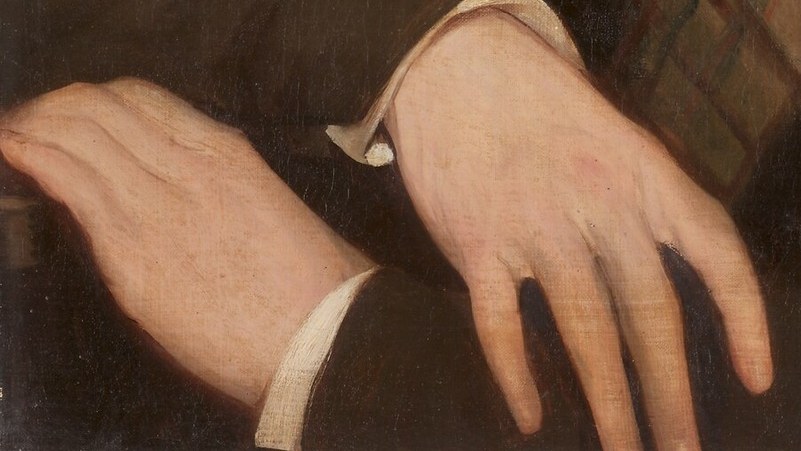 The relaxed pose of his hand suggests ease and confidence.