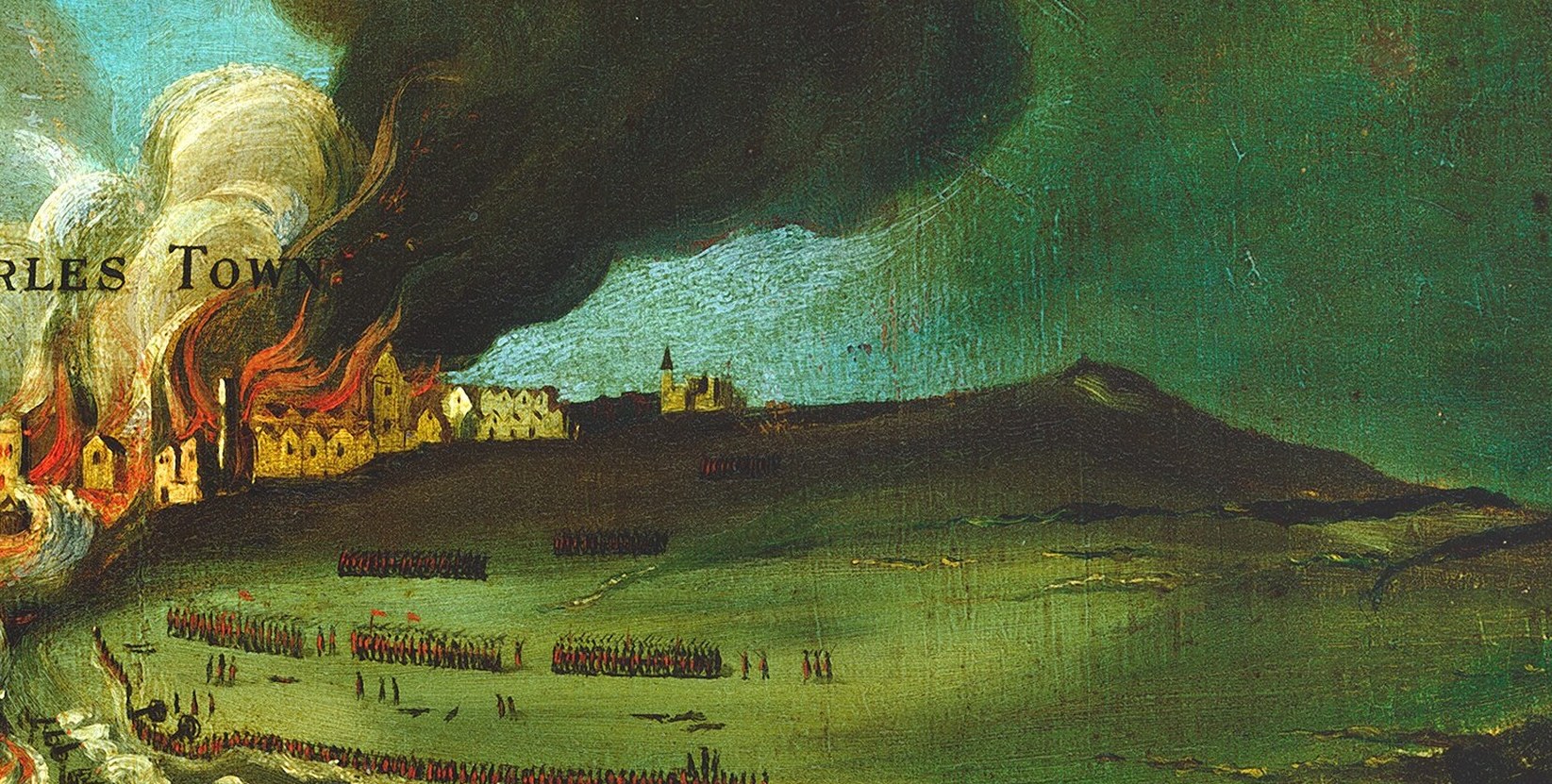 The entire town burned down, seen here in thick smoke.