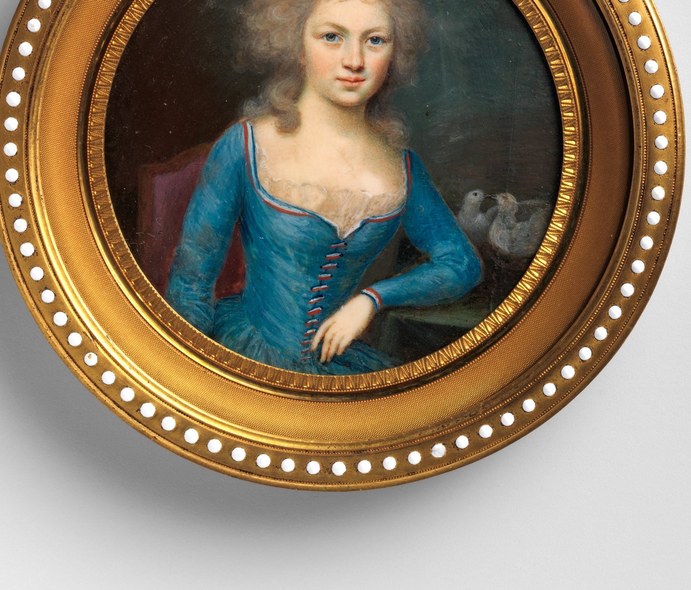 The saturated blue dominates the composition, demonstrating the painter's handling of fabric sheen at miniature scale , impressive illusionism in a tiny format.